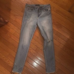 Light washed high waisted ripped jeans